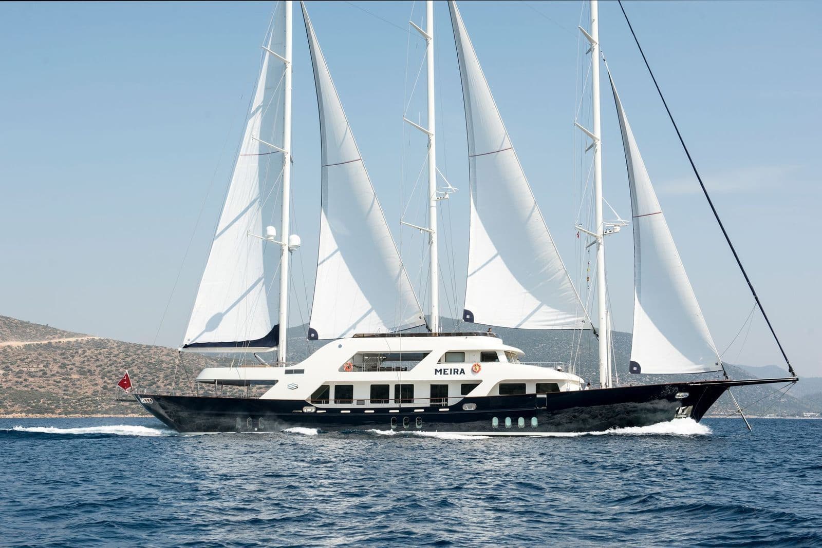 Side view of M/S MEIRA with her sails set