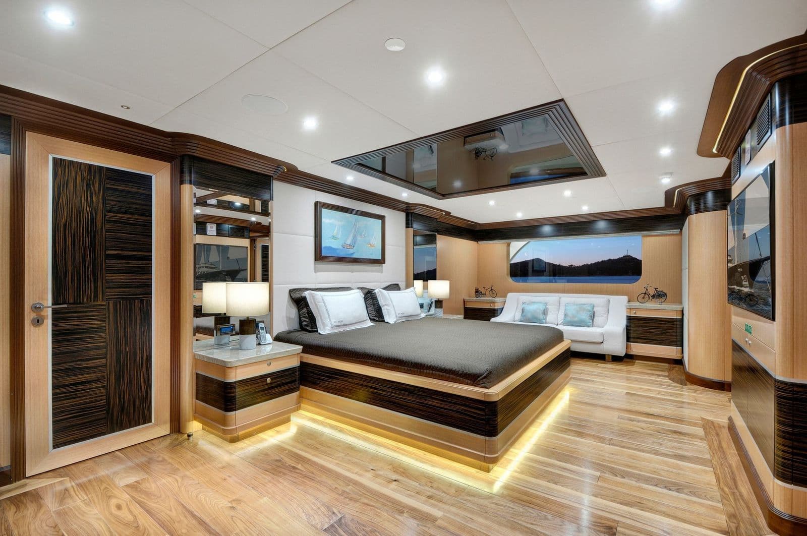 Master cabin with a king-size bed on the main deck
