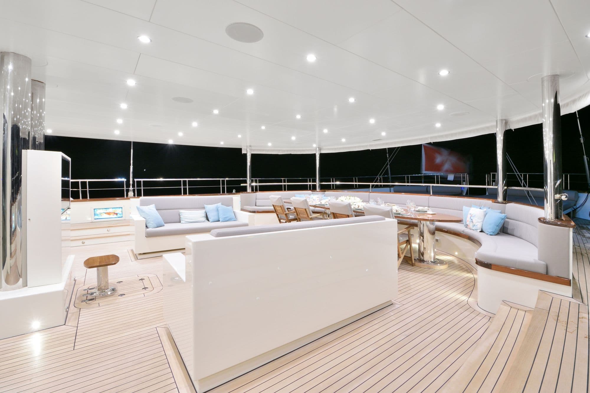 Seating area on the flybridge deck by night