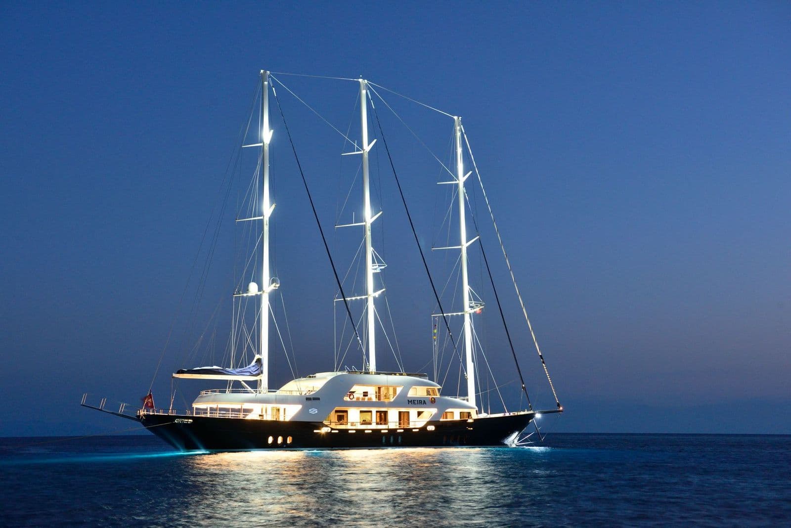 M/S MEIRA at anchor with her lights on at night