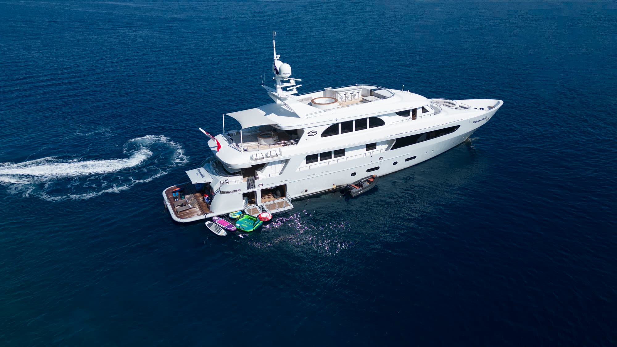 Aerial view of M/Y PRINCESS MELDA with water toys on the stern platform