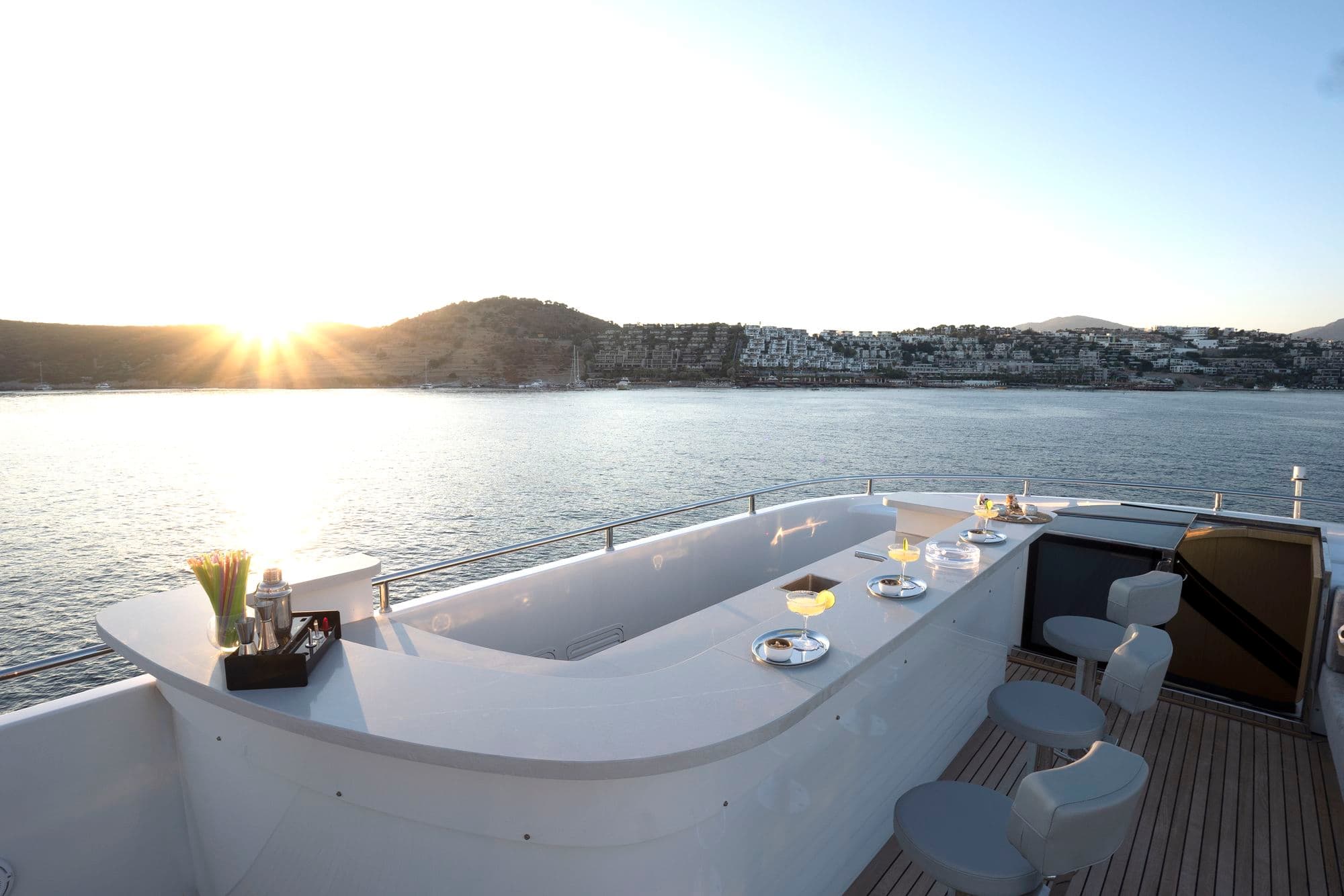 The flybridge bar and sunset view
