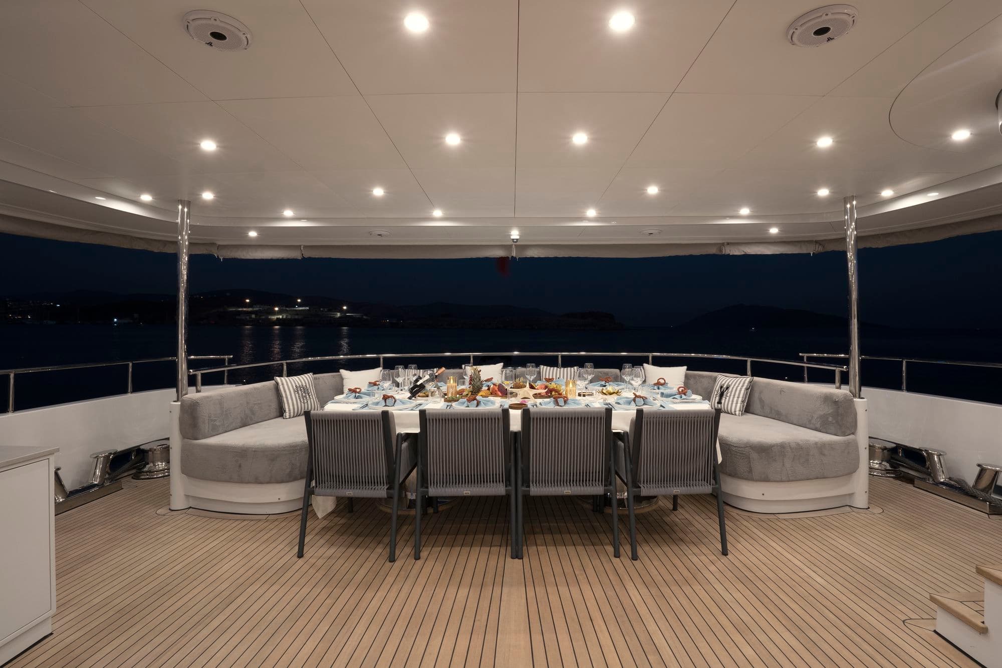 Dining table on the aft deck at dusk