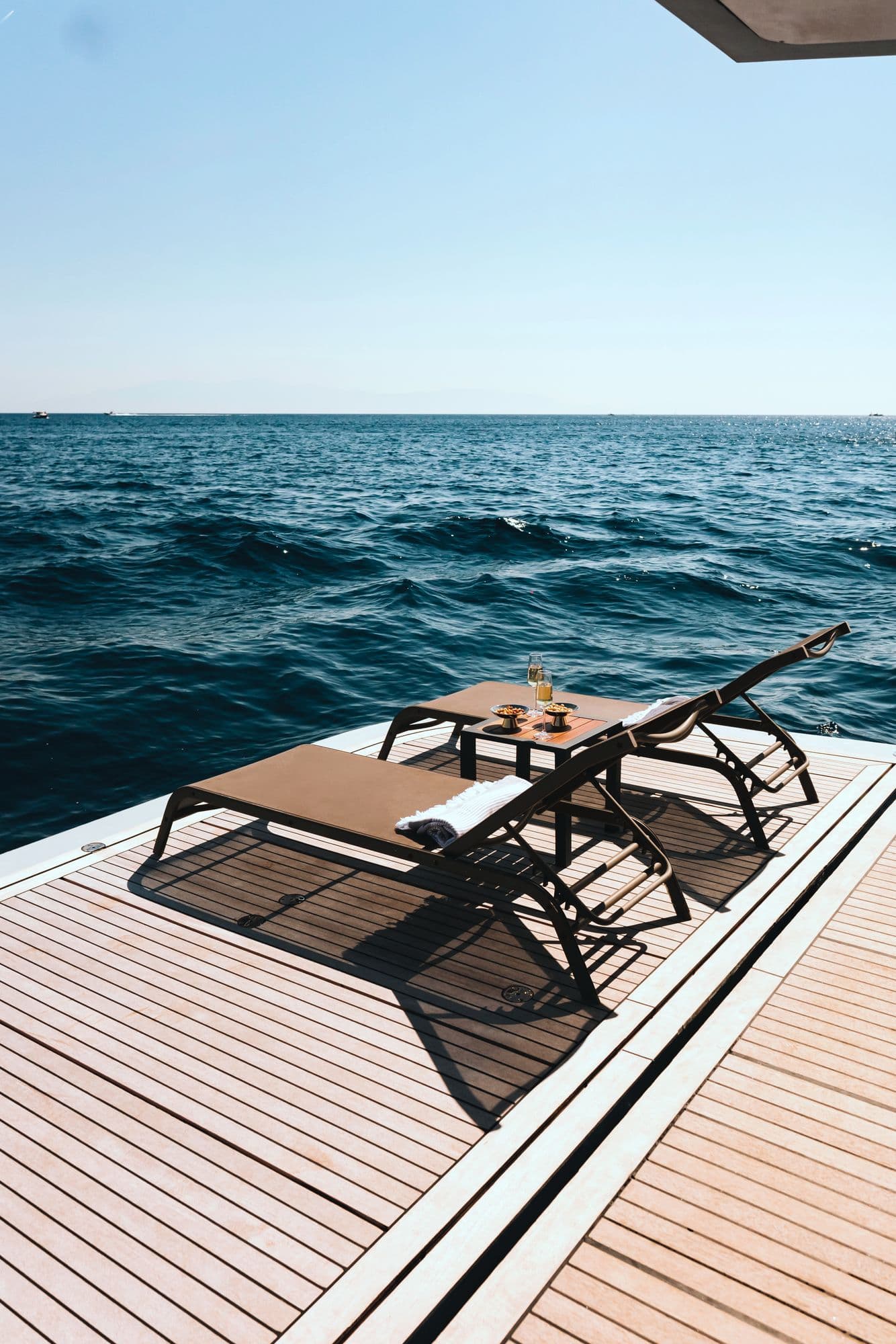 Sun loungers on the swim platform
