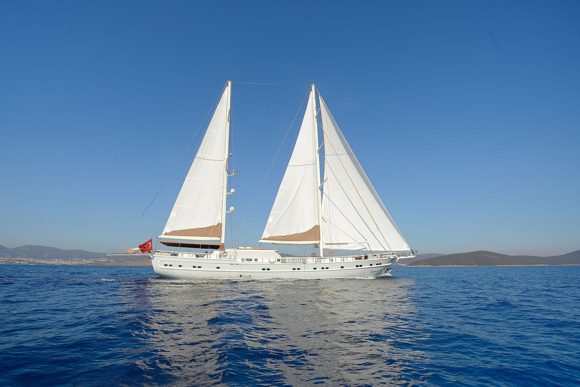 Side view of Queen of Salmakis under sail