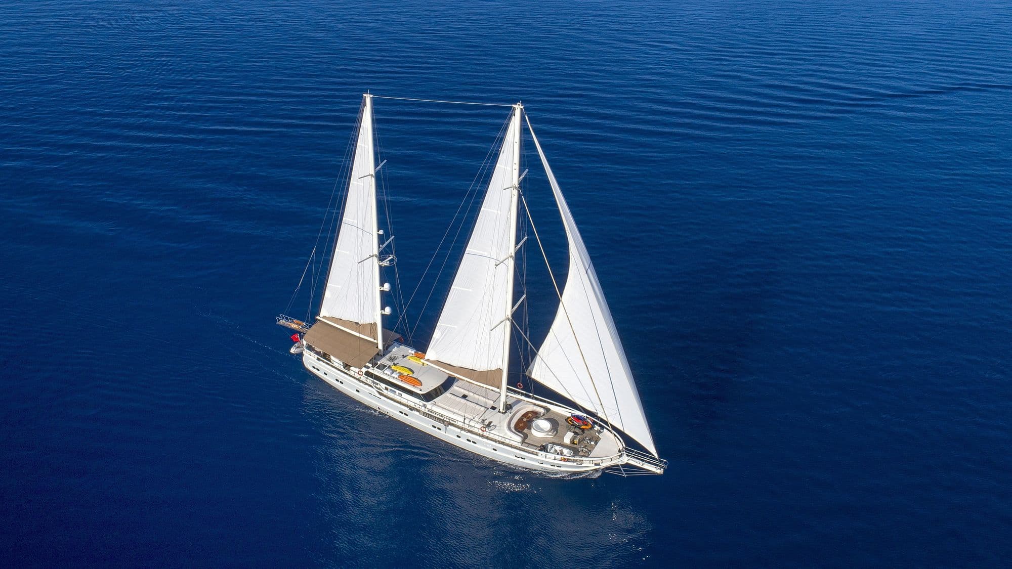 Queen of Salmakis with her sails set, aerial view