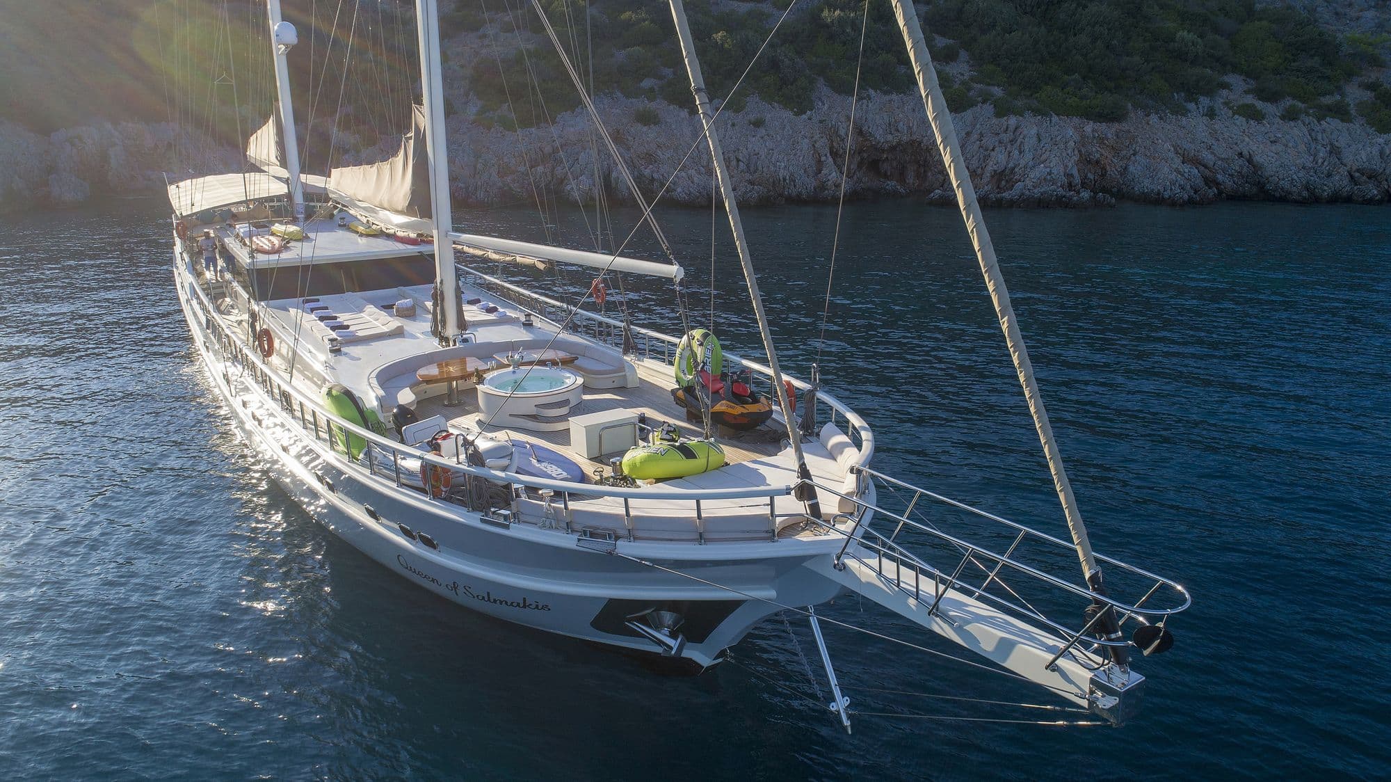 Aerial view of Queen of Salmakis at anchor in a bay