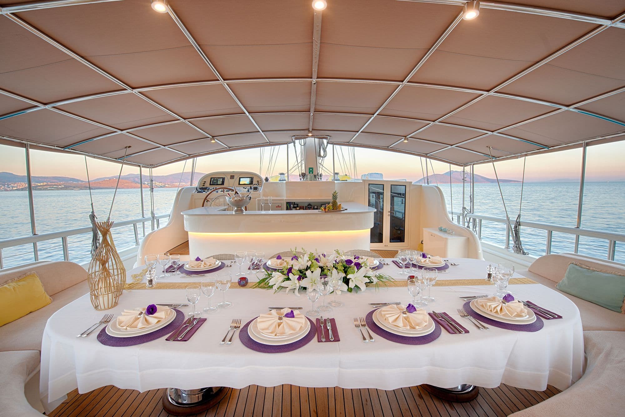 Dinner table on the aft deck at sunset