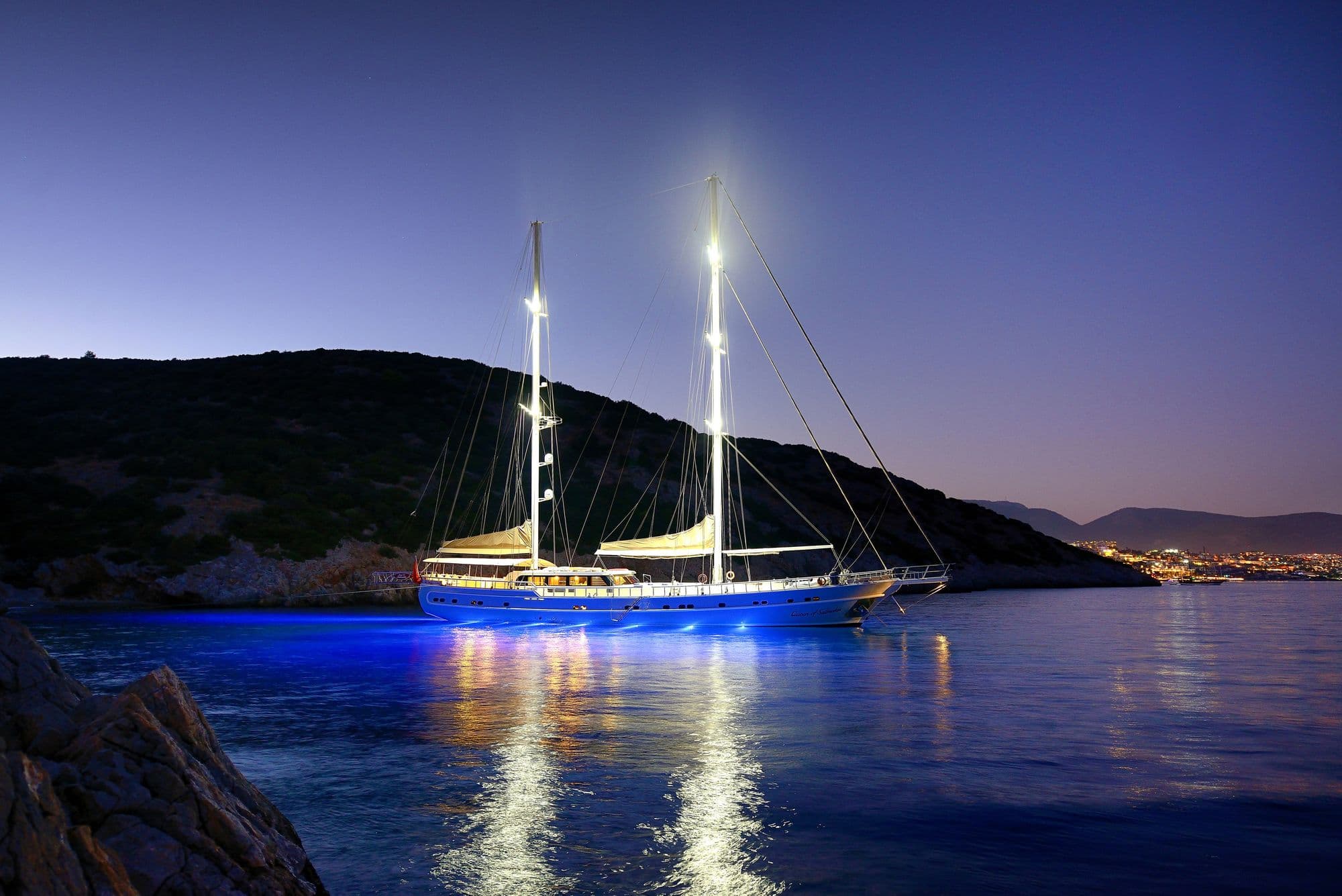 Queen of Salmakis in a bay at dusk