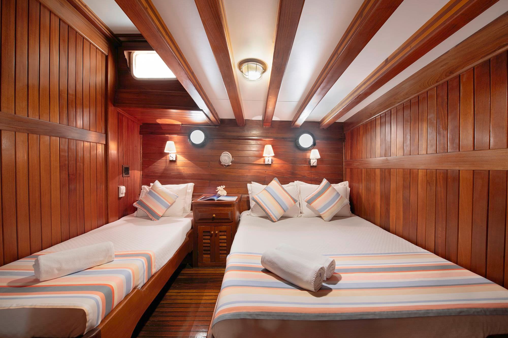 The beds of a triple cabin