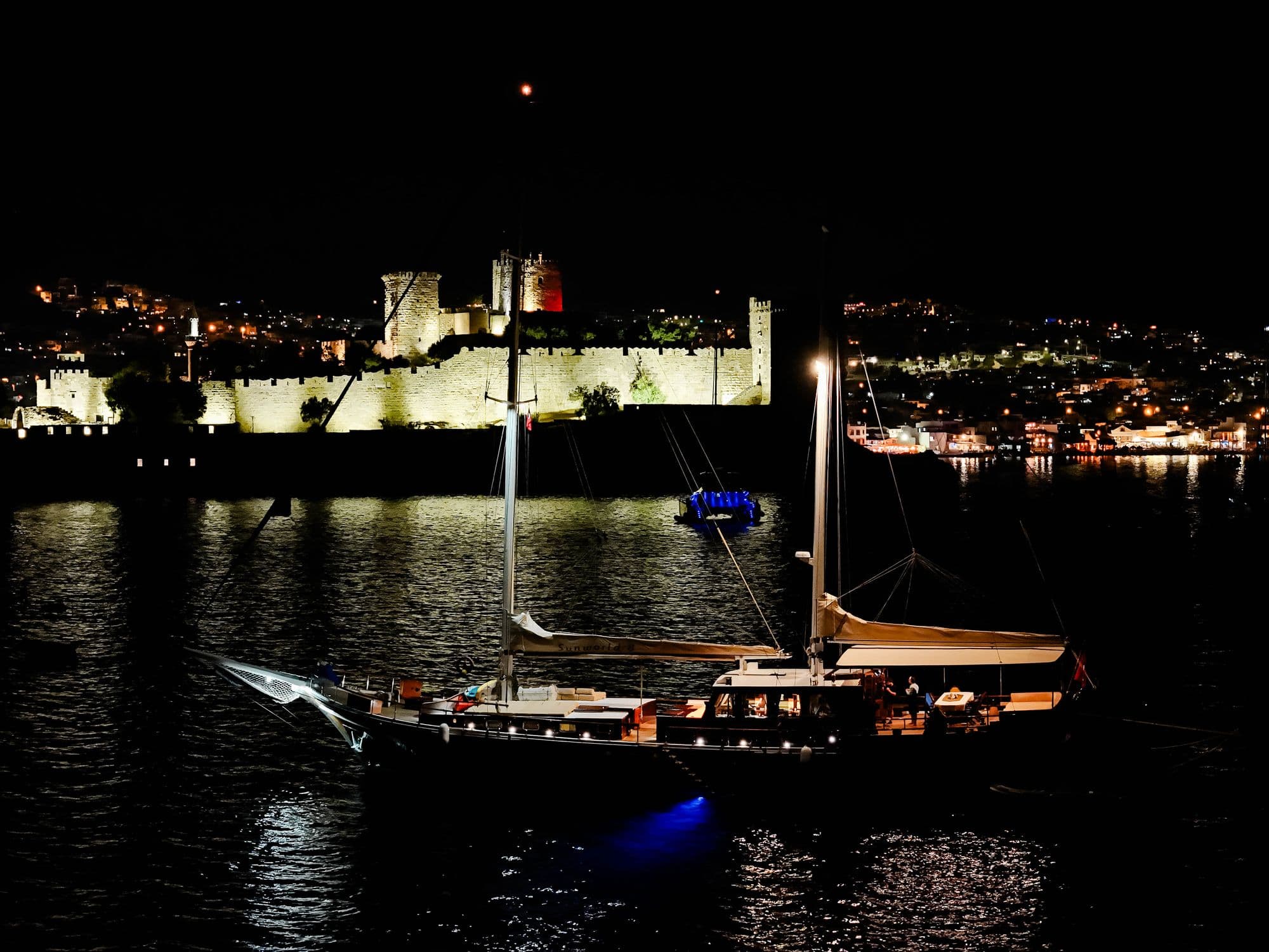 Sunworld-8 in front of Bodrum Castle at night