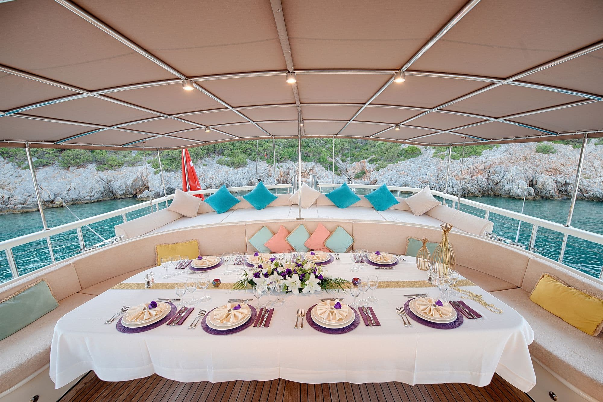 Carefully laid dining table on the aft deck of Queen of Salmakis